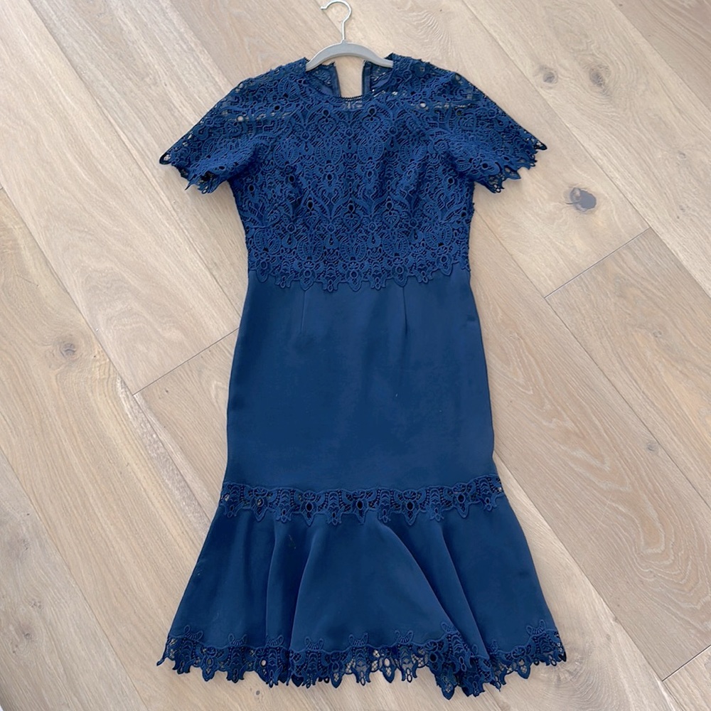 Jonathan Simkai blue dress with beautiful flare at bottom.